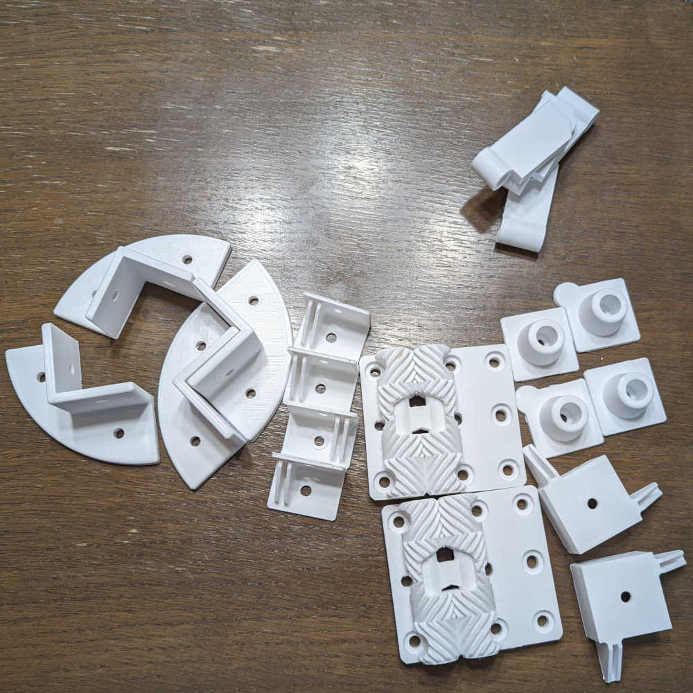 A variety of 3D-printed parts for the enclosure