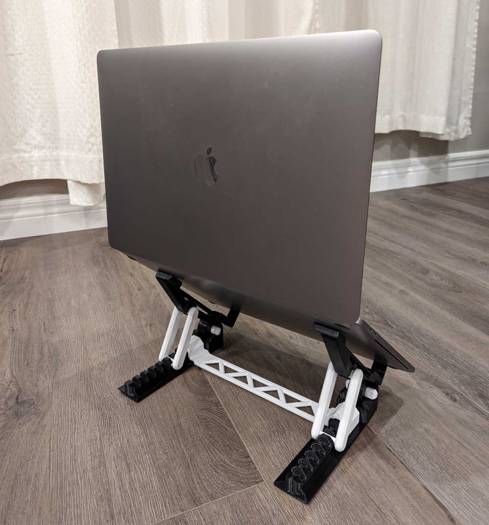 A laptop stand with a laptop