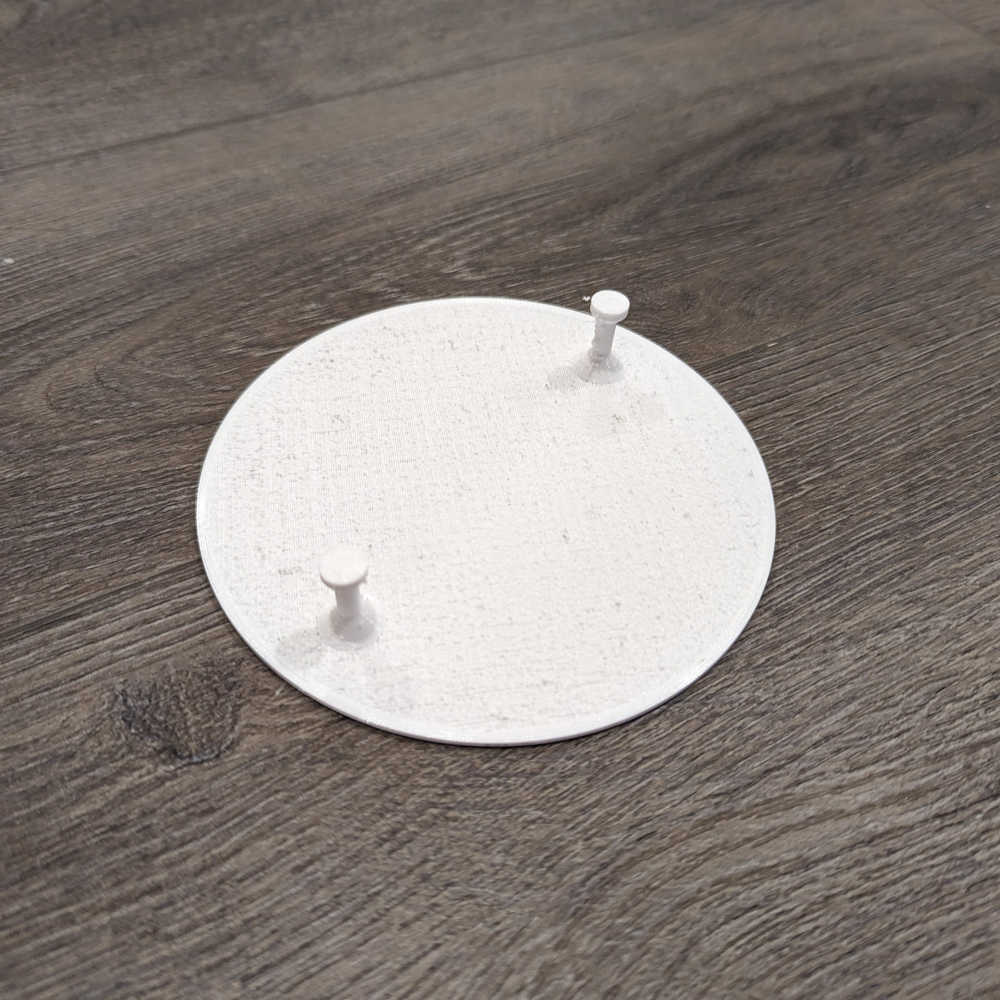 A circular cover for a smoke detector