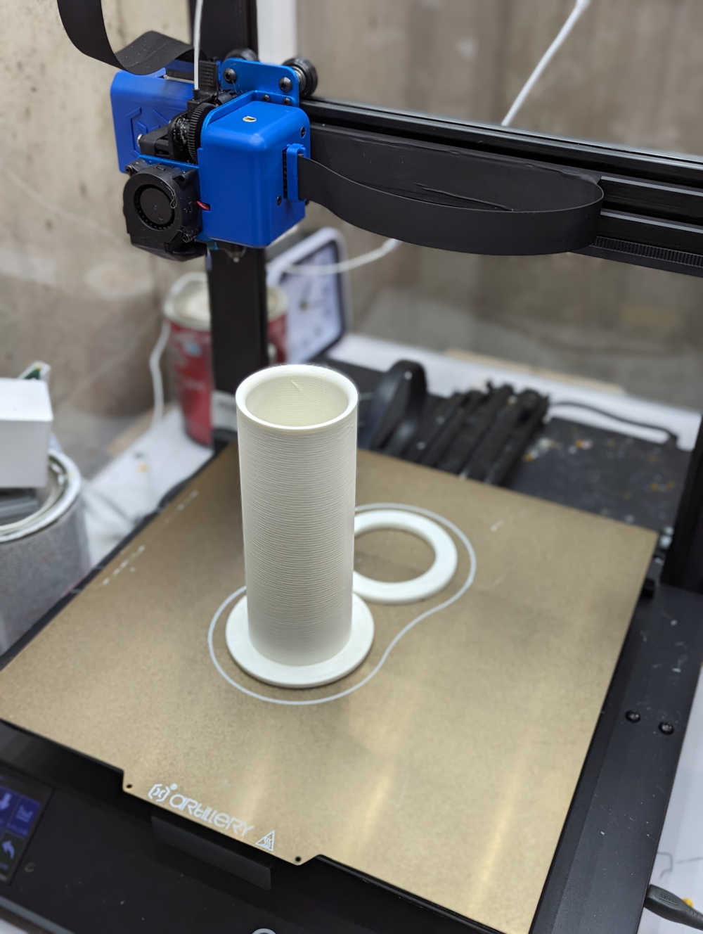 The conduit on the 3D printer bed